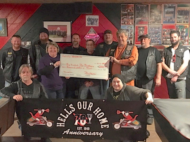 Club donates to mentoring program